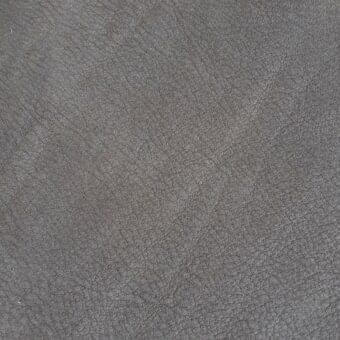 Rugiano NP 60 indoor rug, gray nabuk leather, dense textured surface with subtle grain and linear markings, matte finish.